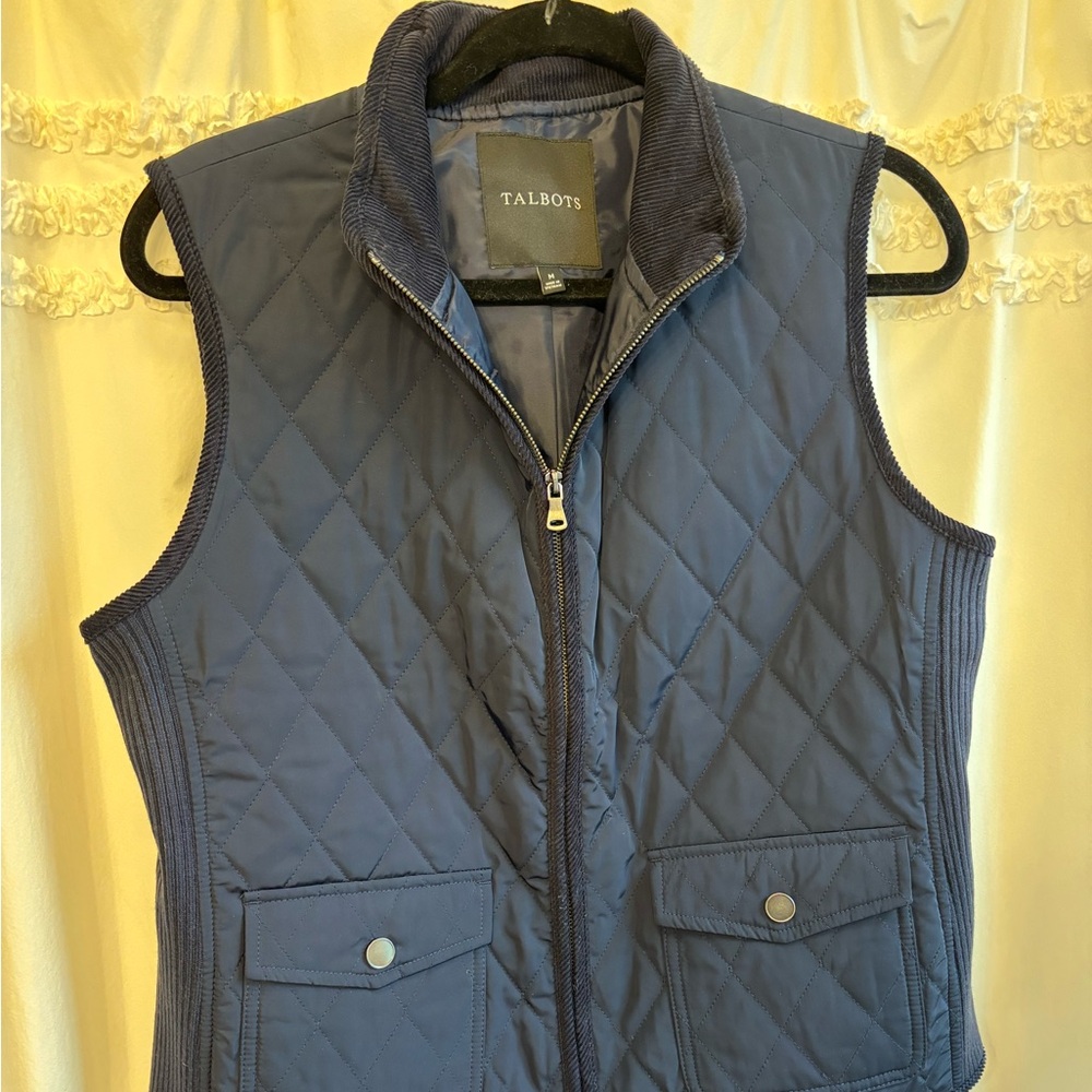 Talbots, navy women’s quilted vest, size medium. Very good condition.